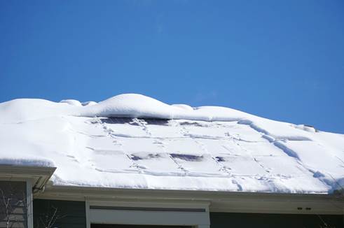 How To Remove Snow From Solar Panels on a Roof